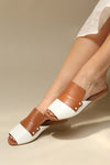 Cardinet White & Tan Slip-On Sandals | La Petite Garçonne Chpt. 2 on model