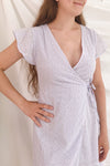 Cassie Lavender Short Wrap Dress | Boutique 1861 on model