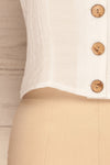 Catarama Cloud White Button-Up Crop Top | La Petite Garçonne bottom close-up
