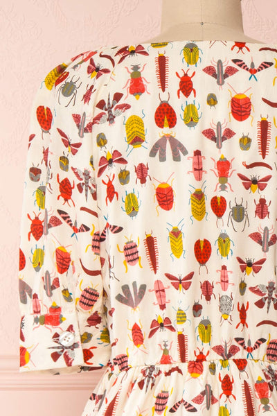 Claretta Cream Insects Printed Short Dress | Boutique 1861 back close-up