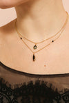 Coleen Moore Golden & Black Pendant Necklace | Boutique 1861 on model