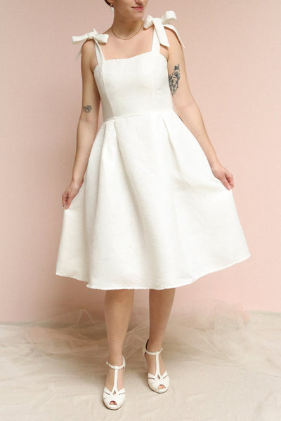 Cybill Ivory Brocade A-Line Cocktail Dress with Bows | Boutique 1861 on model