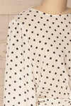 Czersk Blanc White Polkadot Long Sleeved Top | La Petite Garçonne side close-up