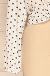 Czersk Blanc White Polkadot Long Sleeved Top | La Petite Garçonne sleeve close-up