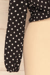 Czersk Noir Black Polkadot Long Sleeved Top | La Petite Garçonne bottom close-up