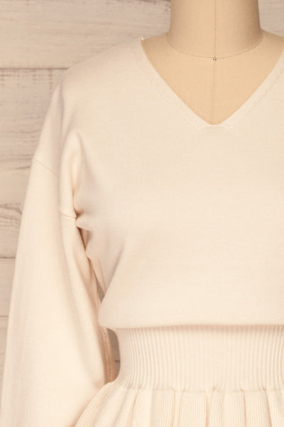 Daryna Beige Puff Sleeved Peplum Knit Top | La Petite Garçonne front close-up