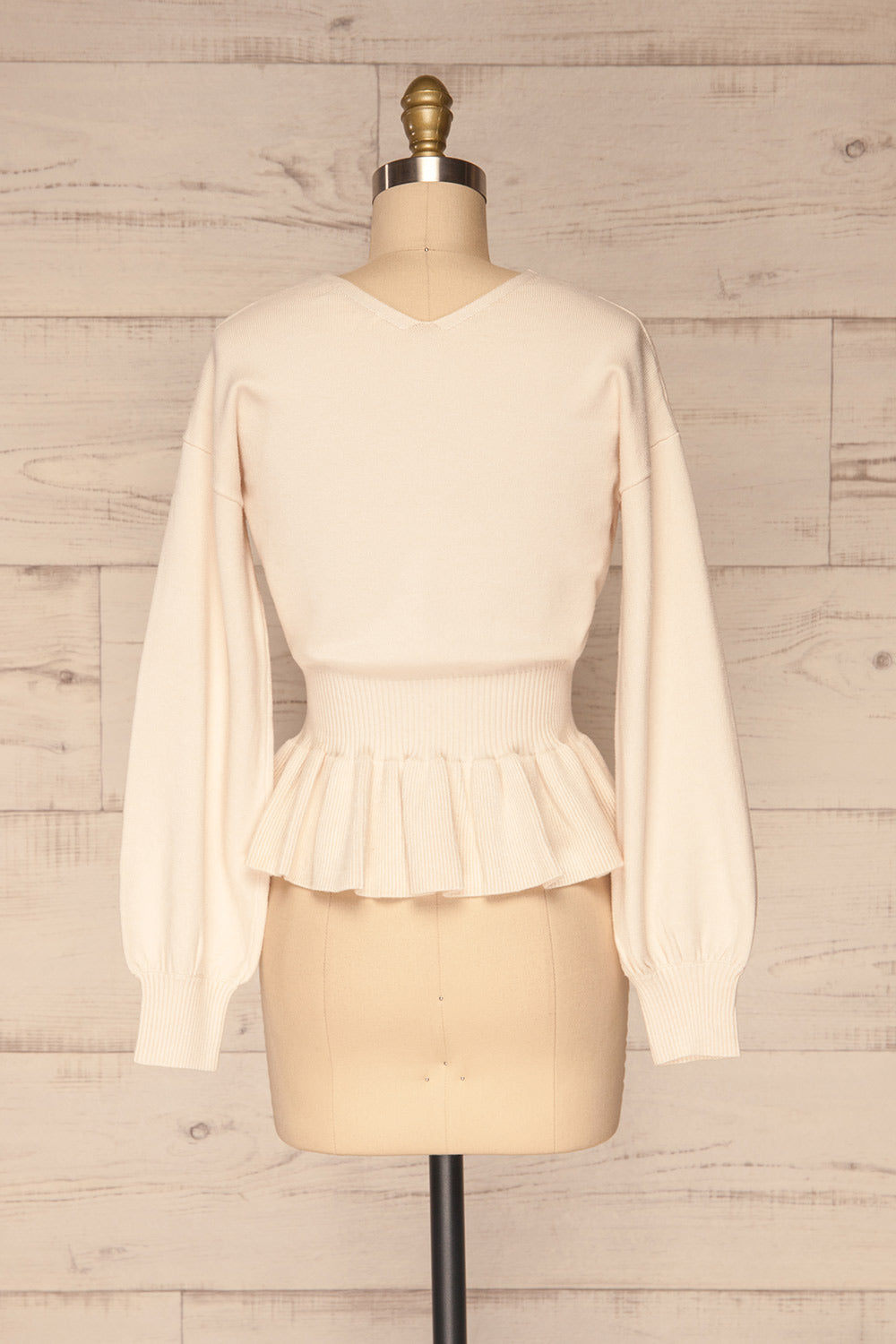 Daryna Beige Puff Sleeved Peplum Knit Top | La Petite Garçonne back view 