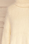 Dassel Ivory Fuzzy Turtleneck Top | La petite garçonne front close-up