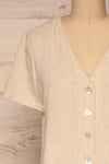 Demetria Beige Short Sleeve Button-Up Dress | La petite garçonne front close-up