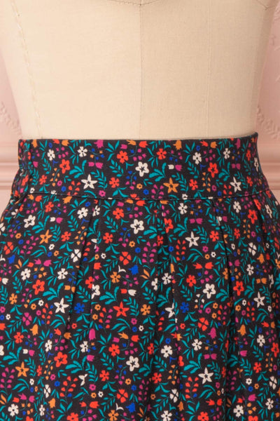 Dorit Black Floral Pleated Mini Skirt | Boutique 1861 side close-up