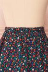Dorit Black Floral Pleated Mini Skirt | Boutique 1861 back close-up
