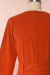 Ellesmere Orange Long Sleeved Midi Dress back close up | Boutique 1861