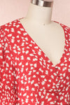 Elsie Red Floral Short Sleeved Romper side close up | Boutique 1861