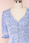 Elsie Sky Blue Floral Short Sleeved Romper front close up | Boutique 1861