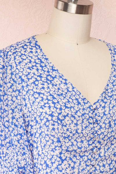 Elsie Sky Blue Floral Short Sleeved Romper side close up | Boutique 1861