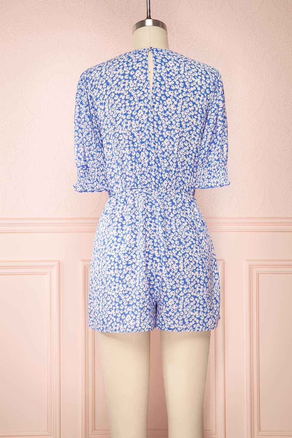 Elsie Sky Blue Floral Short Sleeved Romper back view | Boutique 1861