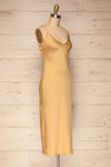 Enea Champagne Yellow Satin Midi Slip Dress | La Petite Garçonne side view