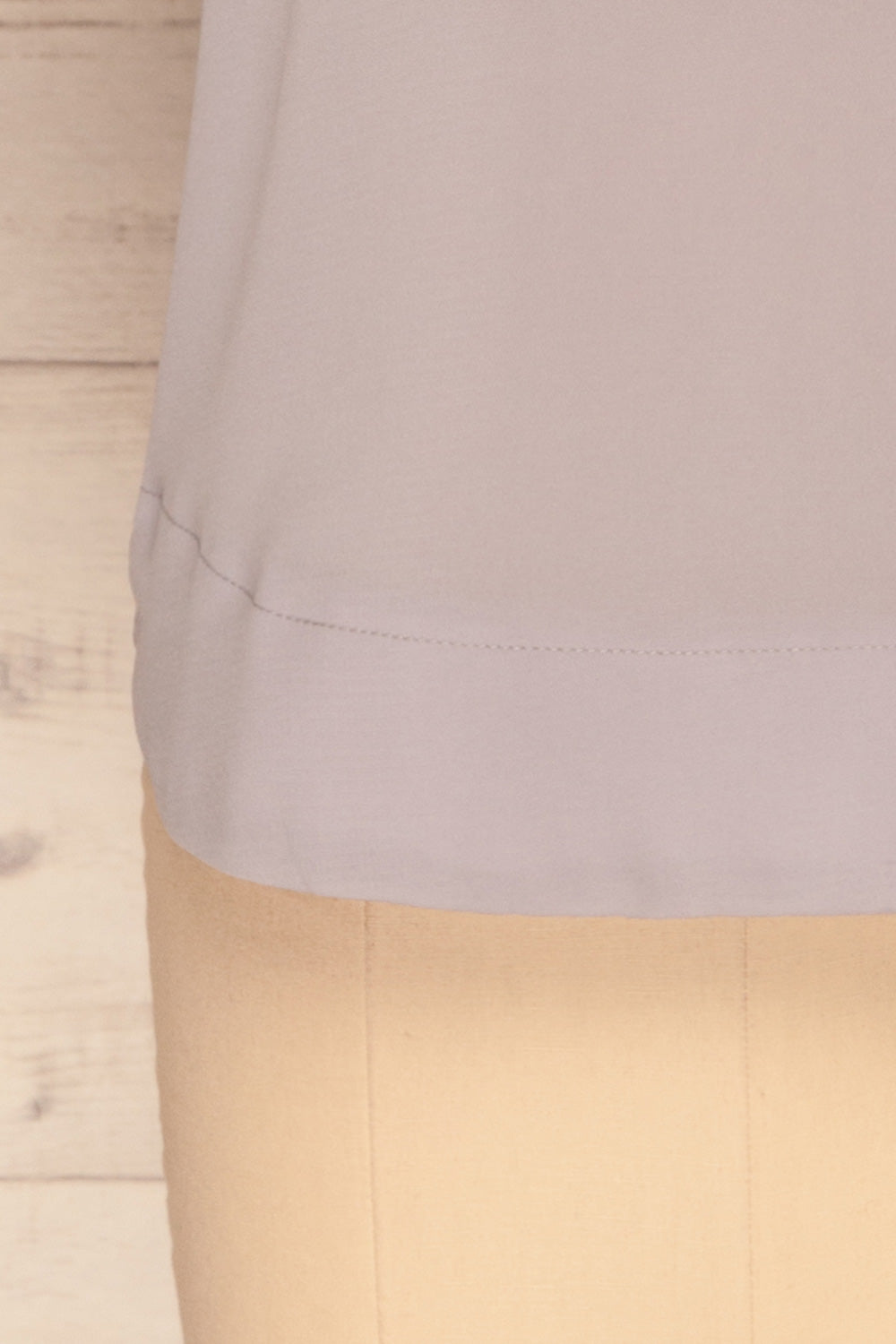 Fallet Grey Boxy Short Sleeved Top | La Petite Garçonne bottom close-up 