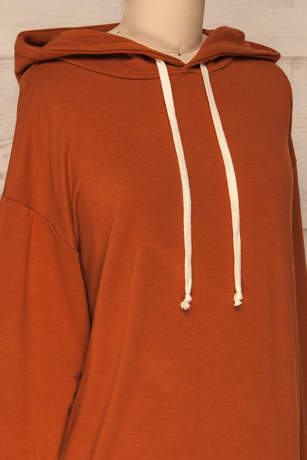Fasseland Clay Burnt Orange Long Sleeved Top | La Petite Garçonne side close-up