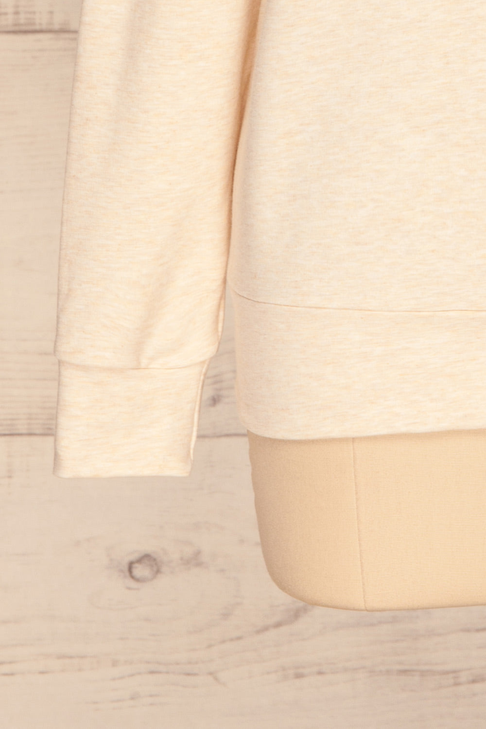 Fasseland Sand Beige Long Sleeved Top | La Petite Garçonne bottom close-up