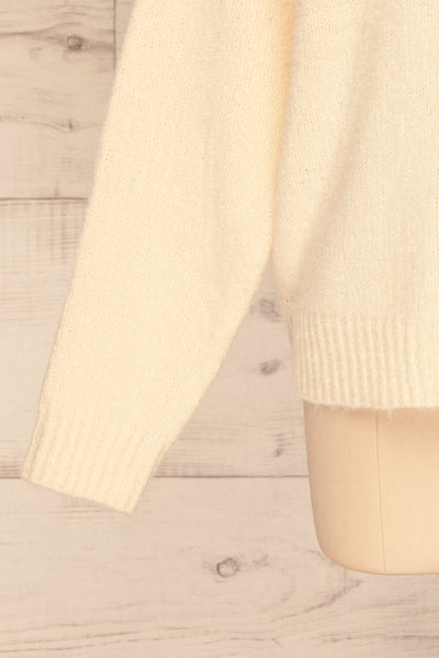 Fauske Avoine Cream Knit Button-Up Cardigan | La Petite Garçonne bottom close-up