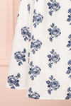 Folium White Midi Summer Dress w/ Flowers | Boutique 1861 bottom close-up