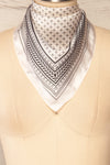 Fornax Beige & Black Patterned Silky Scarf | La petite garçonne triangle close-up
