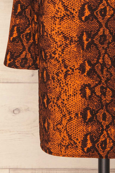 Gliwice Arancia Orange Snake Pattern Dress | BOTTOM CLOSE UP | La Petite Garçonne