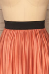 Gouves Pink Pleated Midi Skirt | La petite garçonne  front close-up