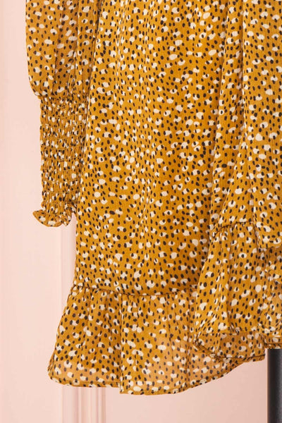 Guada Mustard Yellow Patterned Long Sleeved Dress | Boutique 1861 bottom close-up