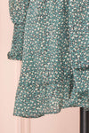 Guada Turquoise Teal Patterned Long Sleeved Dress | Boutique 1861 bottom close-up