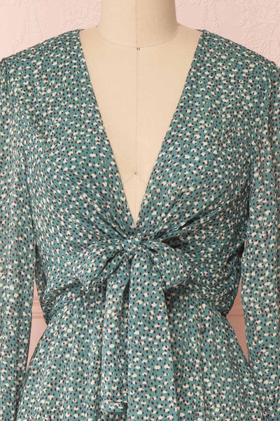 Guada Turquoise Teal Patterned Long Sleeved Dress | Boutique 1861 front close-up bow