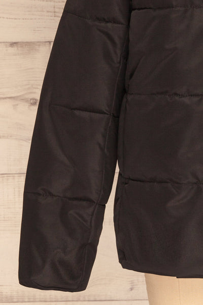 Huddersfield Black Short Quilted Coat with Hood | La Petite Garçonne bottom close-up