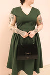 Iktomi Green V-Neck A-Line Midi Dress | Boutique 1861 on model