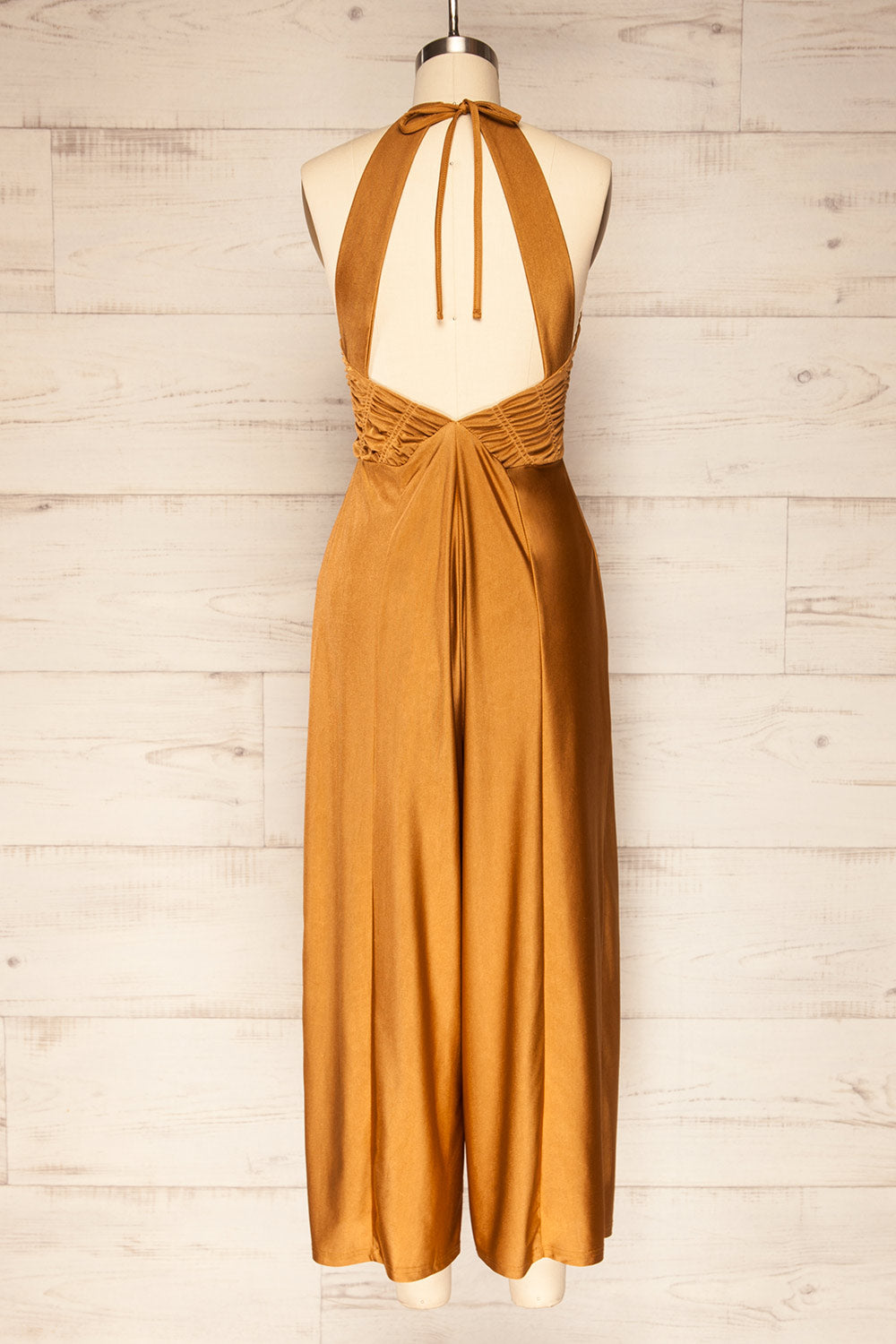 Imatra Gold Flare Leg Jumpsuit w/ Tied Straps | La petite garçonne back view 