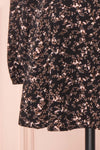 Javouhey Black Floral Long Sleeved A-Line Dress | Boutique 1861 bottom close-up
