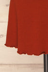 Jutrosin Rust Orange Fitted Cocktail Dress | La Petite Garçonne bottom close-up