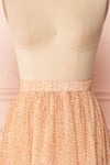 Kaltouma Beige & Orange Floral Midi Skirt front close up | Boutique 1861