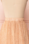 Kaltouma Beige & Orange Floral Midi Skirt back close up | Boutique 1861