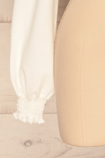 Kastaneai White Crop Top with Front Knot Detail | La Petite Garçonne sleeve close-up