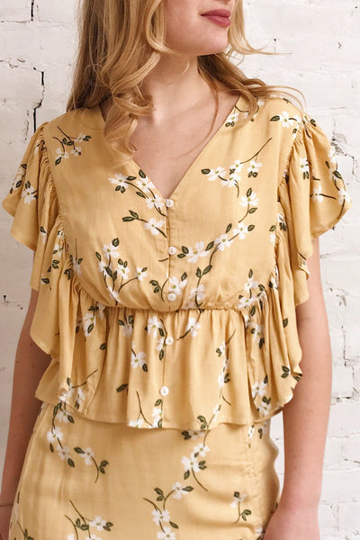 Katalina Yellow Floral Short Sleeve Top | Boutique 1861 on model