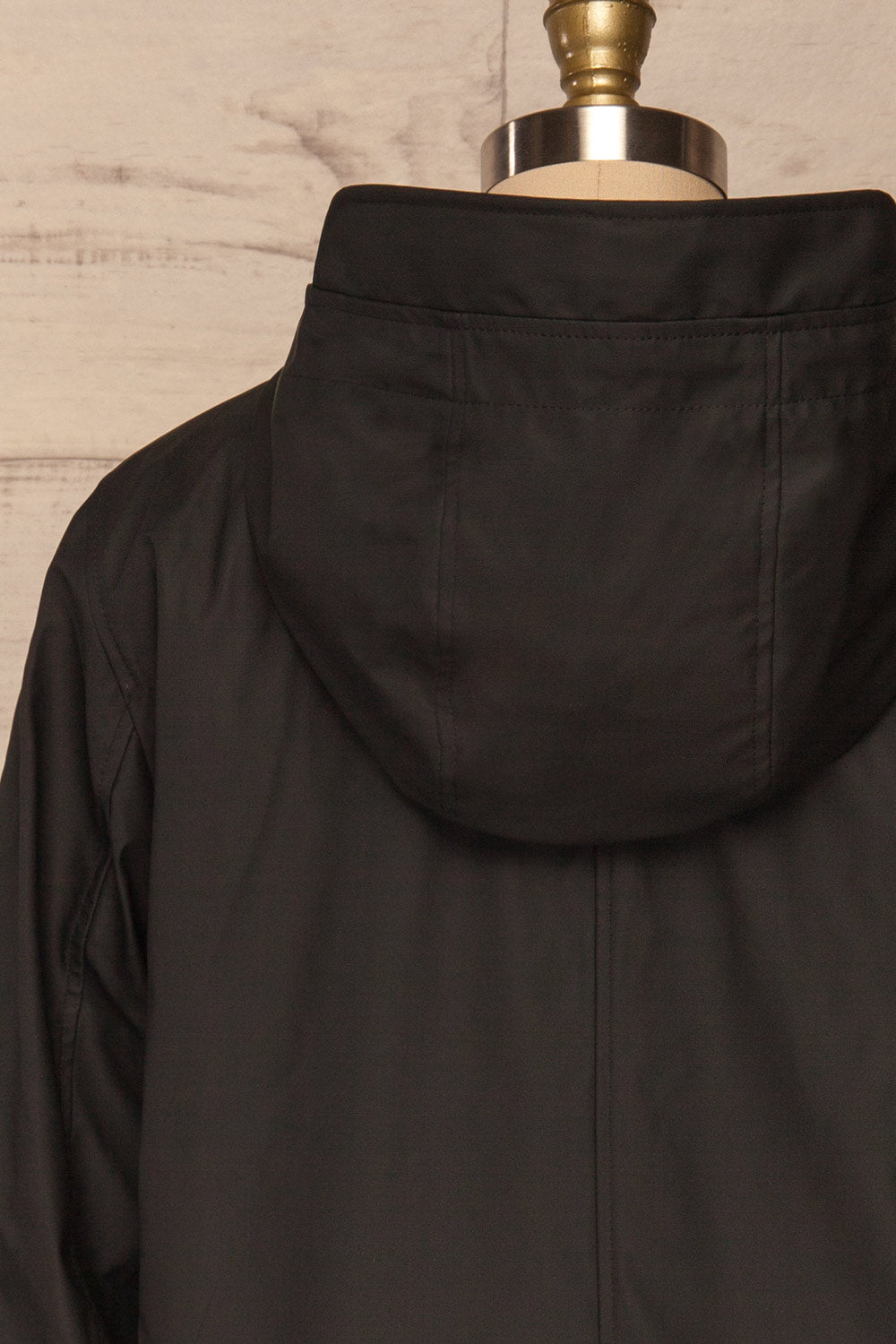 Klodzko Black Wide Hooded Rain Coat | La petite garçonne back close up