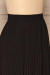 Kornik Coal Black Pleated Midi Skirt|  SIDE CLOSE UP  | La Petite Garçonne