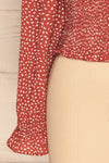 Krobia Rust Red Ruched Crop Top with Puff Sleeves | La Petite Garçonne bottom close-up