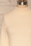 Kuznia Cream Long Sleeve Mock Neck Top | La petite garçonne front close up