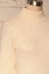 Kuznia Cream Long Sleeve Mock Neck Top | La petite garçonne side close up