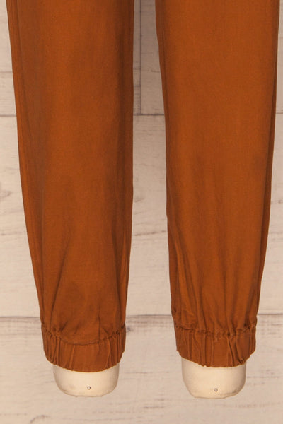 Ladispoli Brown Button-Up Jumpsuit | La Petite Garçonne bottom close-up