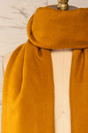 Le Baiser Mustard Soft Knitted Scarf | La petite garçonne cross close-up