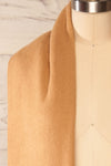 Le Baiser Taupe Soft Knitted Scarf | La petite garçonne shoulder close-up
