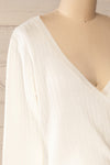 Lixa Ivory Orange Faux-Wrap Long Sleeve Top | La petite garçonne side close-up